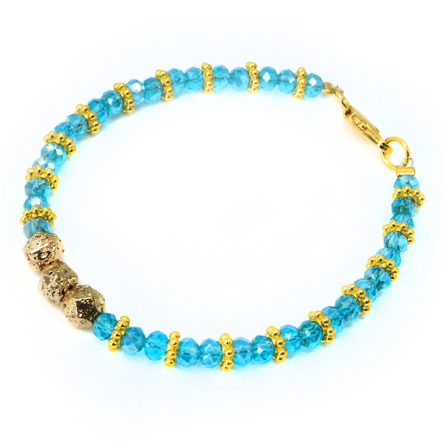 6mm Light Blue Glass Crystal with gold main beads and spacer beads, beaded bracelet. Gold clasp.