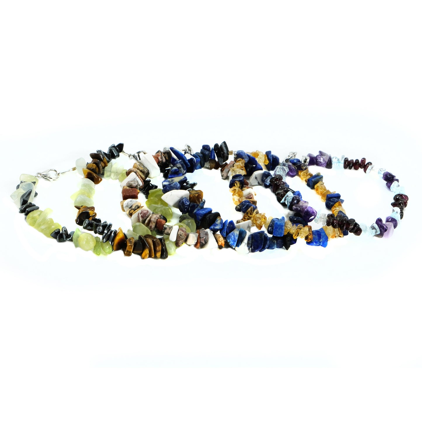 Chipped semiprecious beaded bracelet. Silver clasp. Tigereye, garnet, amethyst, topaz, lapis, aquamarine, agate, howlite, goldstone