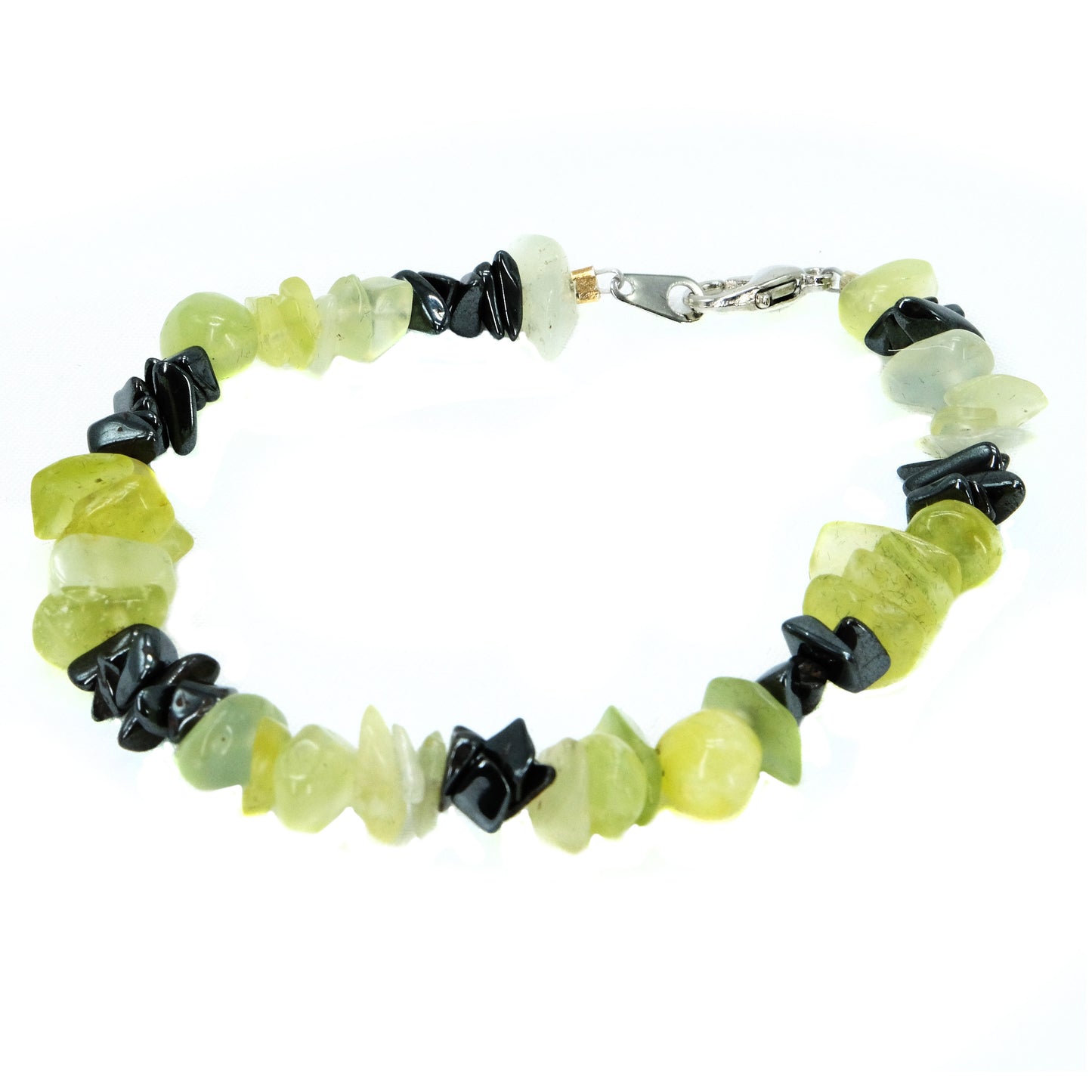 Chipped semiprecious beaded bracelet. Silver clasp. Tigereye, garnet, amethyst, topaz, lapis, aquamarine, agate, howlite, goldstone