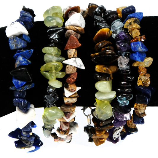 Chipped semiprecious beaded bracelet. Silver clasp. Tigereye, garnet, amethyst, topaz, lapis, aquamarine, agate, howlite, goldstone